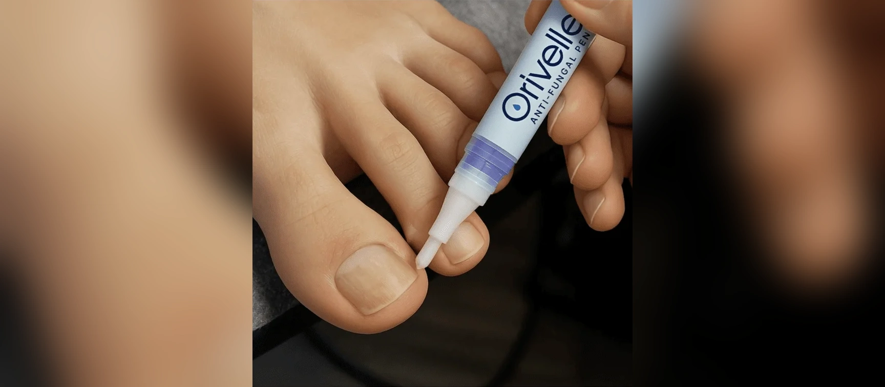 Orivelle Anti Fungal Pen brush applicator being applied to a toenail